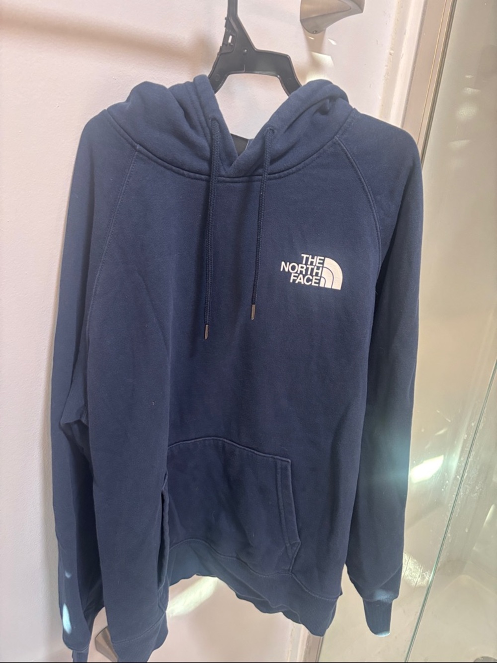 The North Face Navy Pullover Hoodie with White Logo